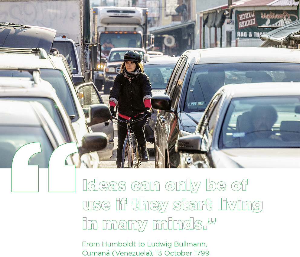 Philadelphia, United States: cyclist in city traffic, December 2016 