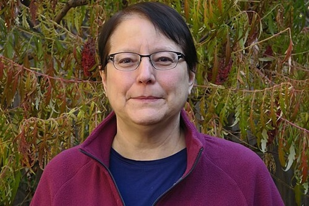 Portraitfoto von Marie Josee Fortin, einer Frau mit kurzen dunklen Haaren
