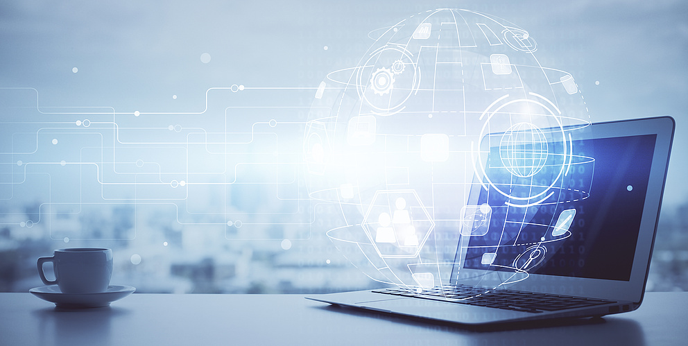 Computer on desktop with social network hologram. Multi exposure. Concept of international people connections.