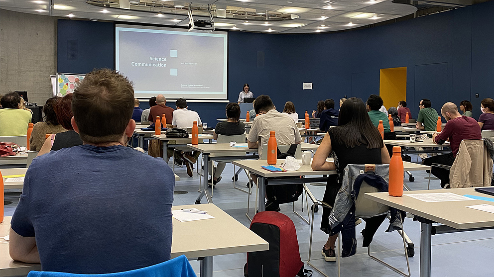 Participants of the Summer School "Communicating Science" in the seminar room listening to their first lecture